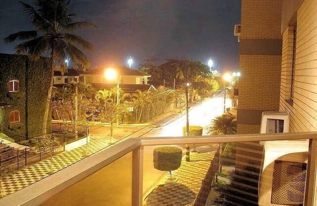 One block from the cove beach in Guarujá - 2 suites