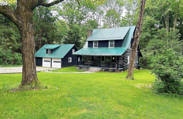 Original log cabin on 3 private acres