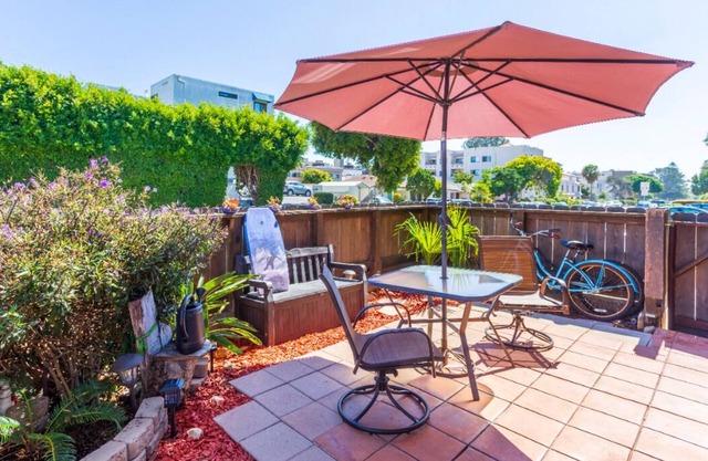 PB Condo only Steps to the Bay with Private Patio!