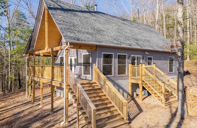 Peaceful A-frame cabin with hot tub, forest views, modern comfort, and total privacy in nature.