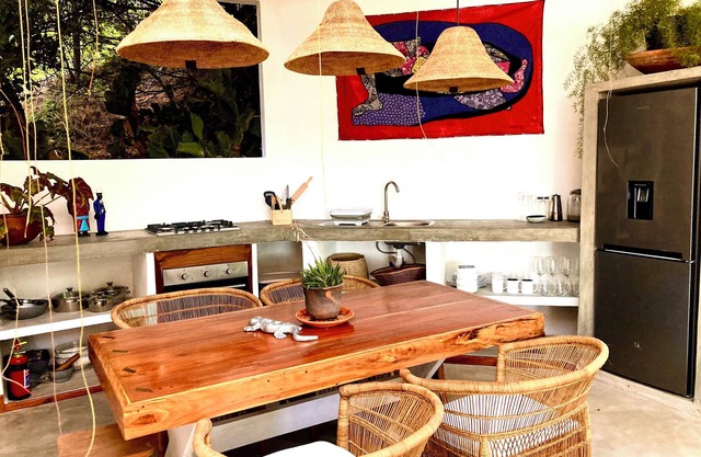 Peaceful and secluded beach house with a private tropical garden