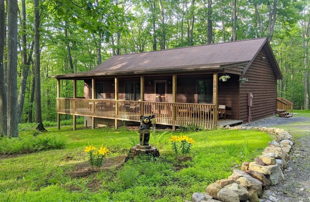 Peaceful hideaway with large yard, hot tub, grill, firepit, smart TVs, & AC