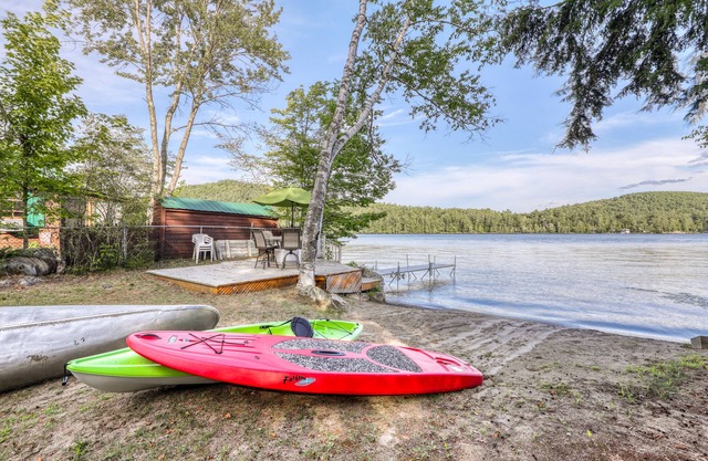 Peaceful lakefront house with private dock and sandy beach