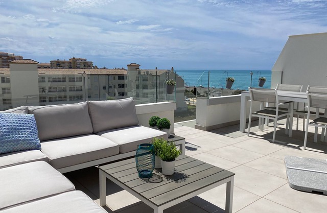 Penthouse closest to the sea with large private roof terrace, sea view, wi-fi and garage