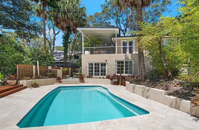 Poolside Retreat by HolidayCo.