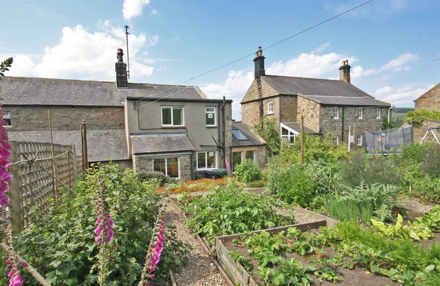 Pretty stone cottage in the picturesque village of Greenhaugh only 4. 5 miles from Bellingham .
