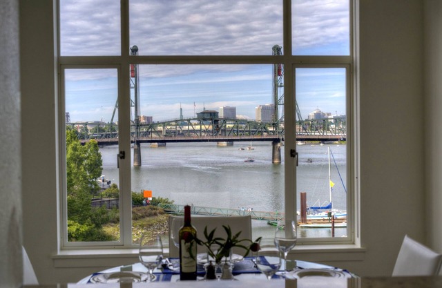 Prime River View: spacious, light-filled top floor corner unit downtown