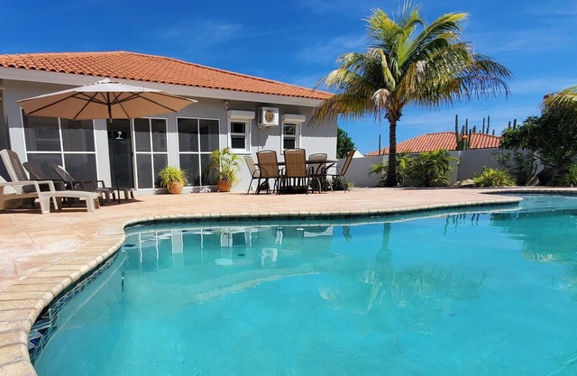 Private 3BR Oasis w/Pool & Garden – 1 .1miles to Palm Beach, Ideal for Families