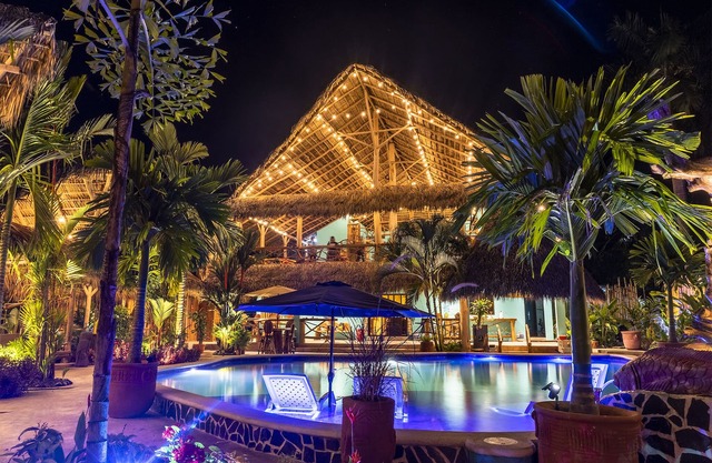 Private beach house paradise w/private pool bar and game area.
