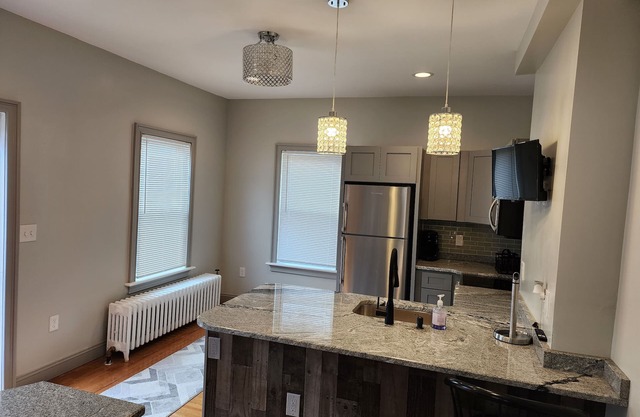 Private furnished studio. Close to hospitals, parks & commuter rail.