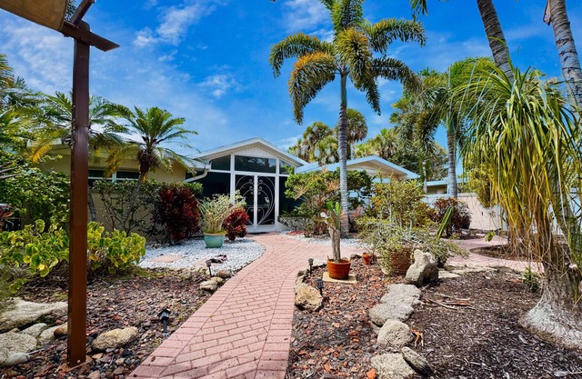 Private Oasis at the Beach with HEATED Pool, Dock and Boat….Dolphin paradise!