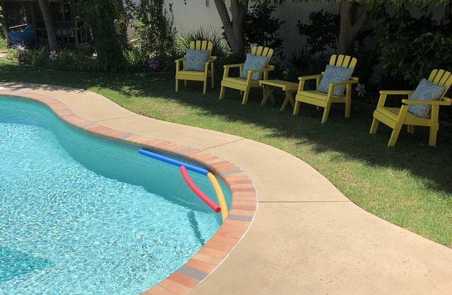 Private property beautifully landscaped and pool with a 2 bed 1 ba unit