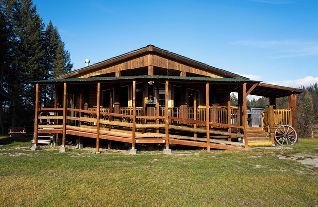 "Private" - Ranch House on 9 acres that borders State Forest