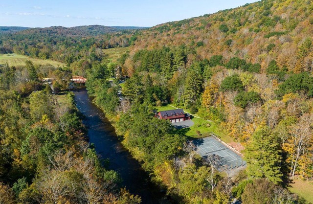 Private river-front home with tennis court and hot tub in the Berkshire hills!