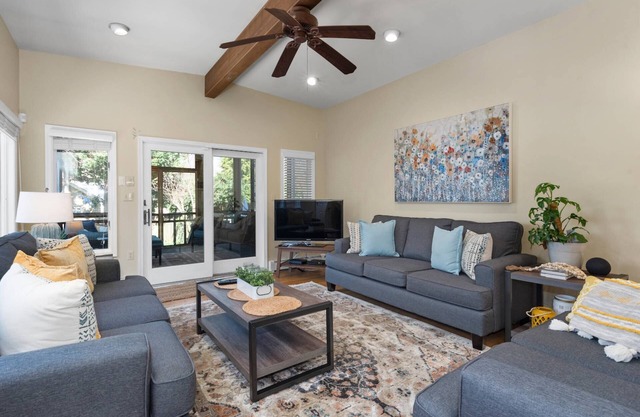 Private yard and screened porch at Historic happy home, steps to Main Street with parking