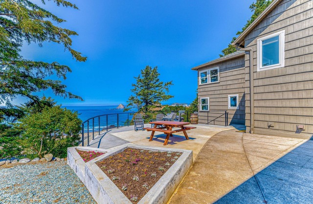 Quaint ocean-view escape with modern interior, smart TV, & gorgeous deck