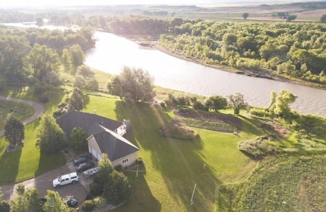 QUIET COUNTRY LIVING AT RIVER'S EDGE