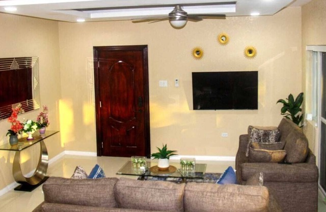 Quiet, gated, and centrally located modern apartment with scenic mountain views.