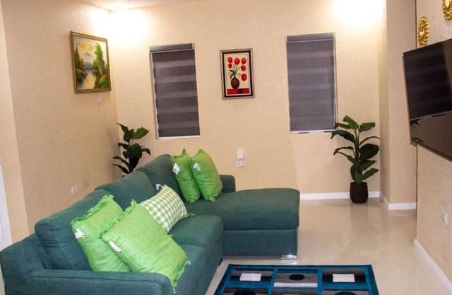 Quiet, gated, and centrally located modern apartment with scenic mountain views.