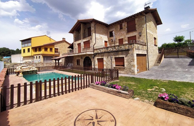 Quiet house on the outskirts of the city surrounded by pine forests and hills.
