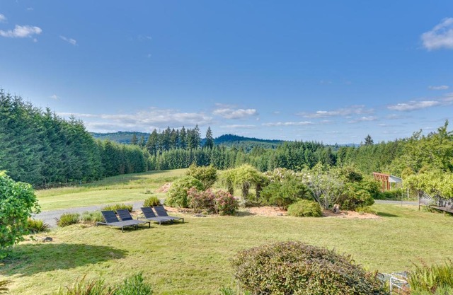 Rainier Home on 20 Acres with Blueberry Farm!