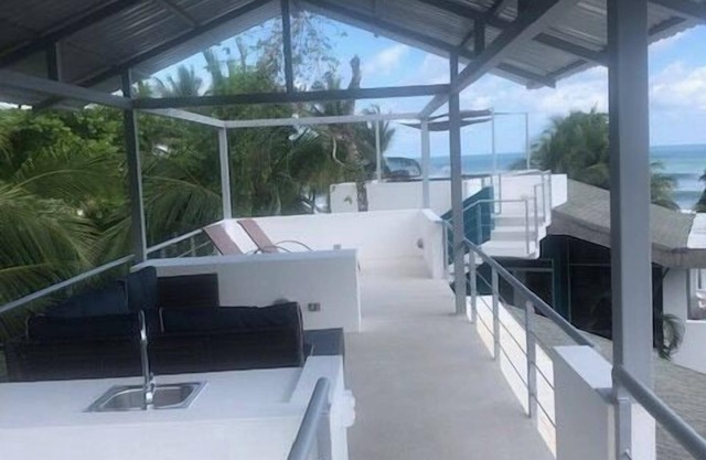 Relax and enjoy sea breezes and sea views on the roof top patio.