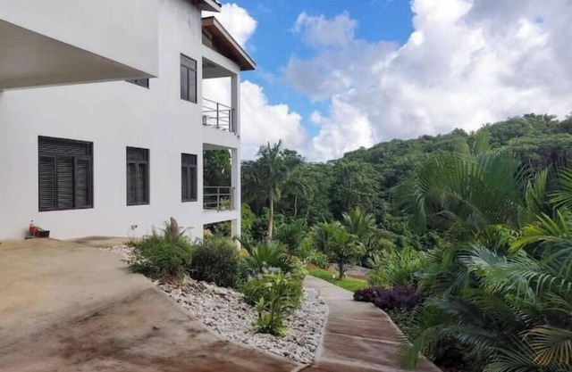 Relax and Reconnect: A peaceful holiday home nestled in lush green surroundings.