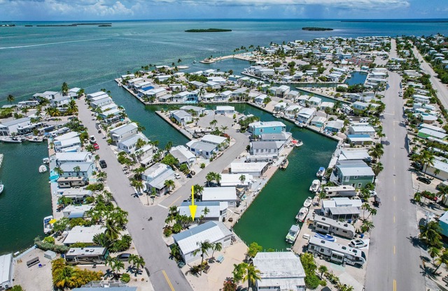 Relax at Keys Time – 2BR Waterfront Rental w/Kayaks, Bikes, and Boat Dock
