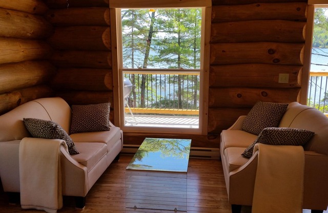 Relax In Canada: A Lakeside Log Cottage Near Kejimkujik National Park