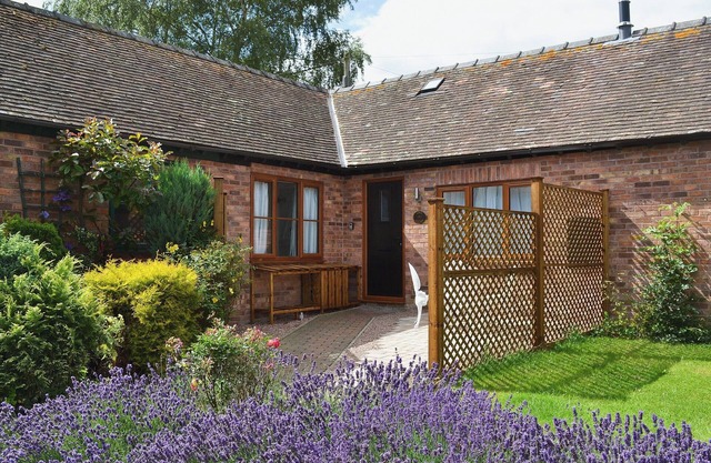 Relax in front of the woodburner in this single-storey barn conversion.