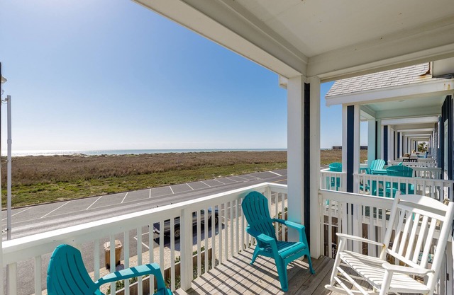 Relax to the sounds of waves at this lovely property, steps from the beach.