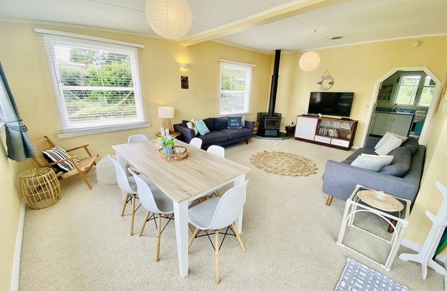 Relaxing cosy 1950's family beach house 1 block back from the beautiful beach.