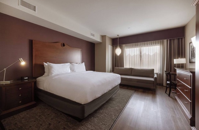 Relaxing Urban Escape with Cozy Beds, Calming Decor and Fitness Center