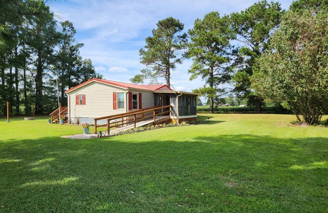 Remodeled home w/firepit, large yard & amenities of home. Quiet and cozy!