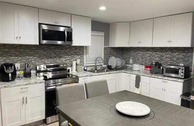 Renovated Modern Stylish “Vibrant” 4bdrm Home