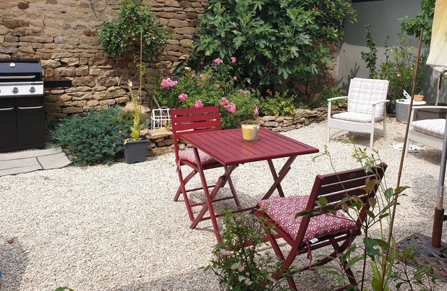 Restored farmhouse with spacious living area in a charming Burgundian village.