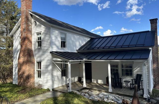 Restored historic farmhouse on 25 private acres