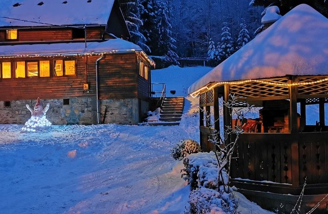 Romantic chalet in the forest area, with a stream in the garden
