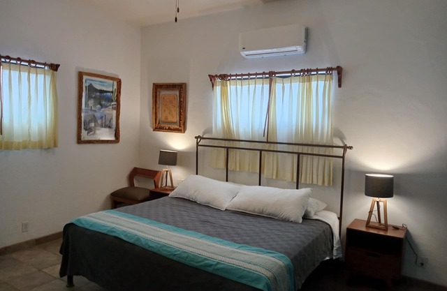 Room #6 Master with one king size bed, one double bed & one double bunk bed