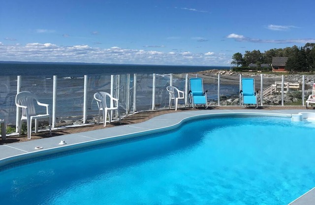 Rustic seaside cottage with private heated pool