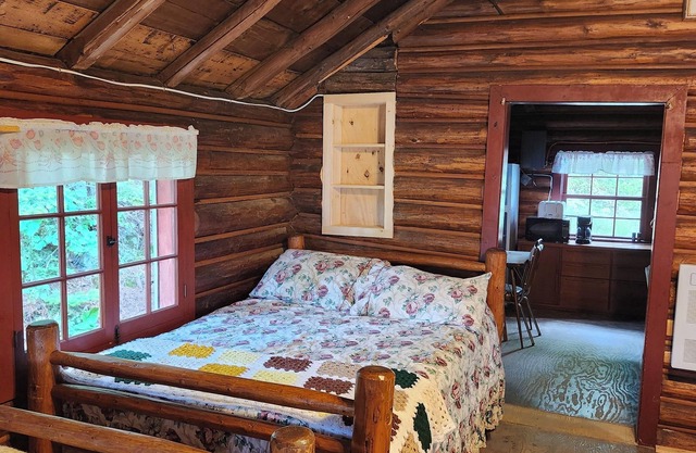 Rustic Log Cabin #8 on Crow Lake at Bull Moose Lodge. Family and pet friendly