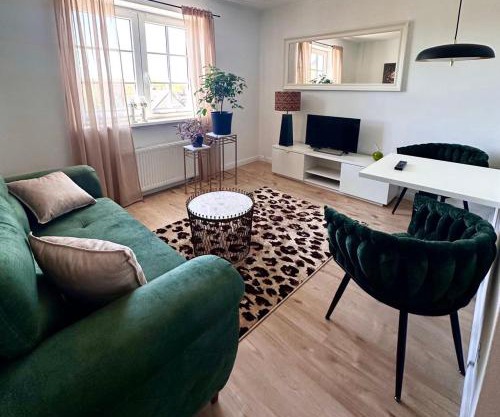 Schön gelegene und gemütliche Ferienwohnung am Weserufer