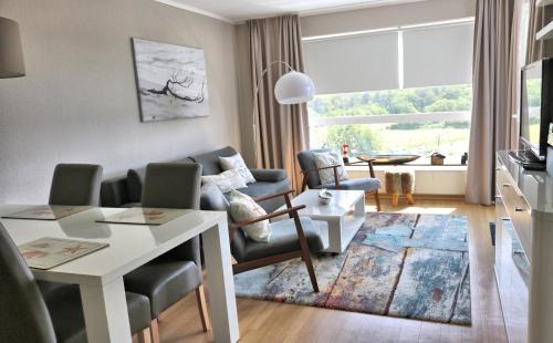 Schicke FeWo 150m vom Strand kostenlos WLAN großes Schwimmbad Sauna