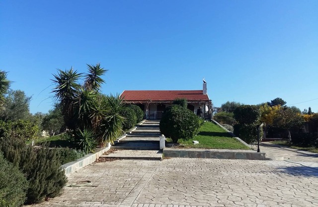 Seafront cottage with orchard and garden