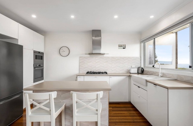Seatheview with direct foreshore access, stunning views, and modern family comforts.