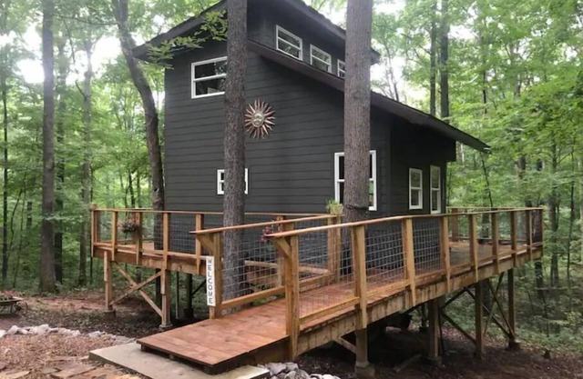 Secluded treehouse with indoor fireplace