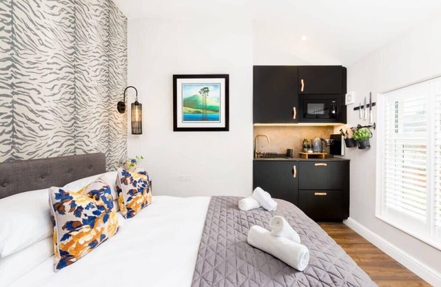 Second floor compact studio with mini kitchen