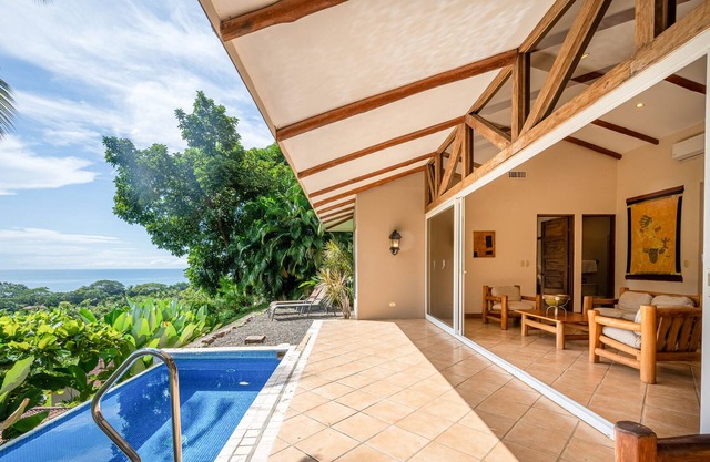 Serene home in lush setting with private plunge pool, ocean & mountain view