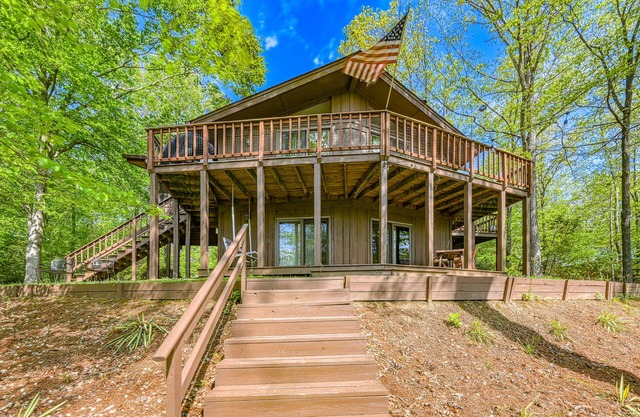 Serene lakefront home with free WiFi, private dock, game room, & central AC