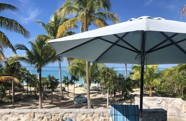 Shangri-La- beach front views of crystal-clear blue waters and surreal sunsets.
